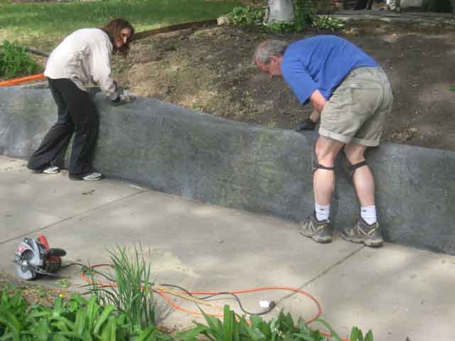 Covering retaining wall with Rock-on-a-roll